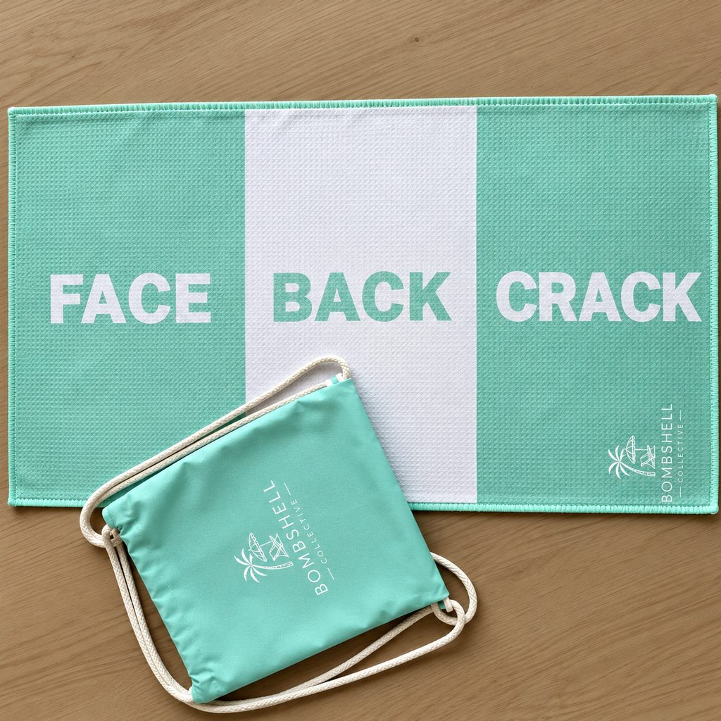 Bombshell Collective aqua gym towel with matching drawstring carry bag, a fun and practical workout accessory.