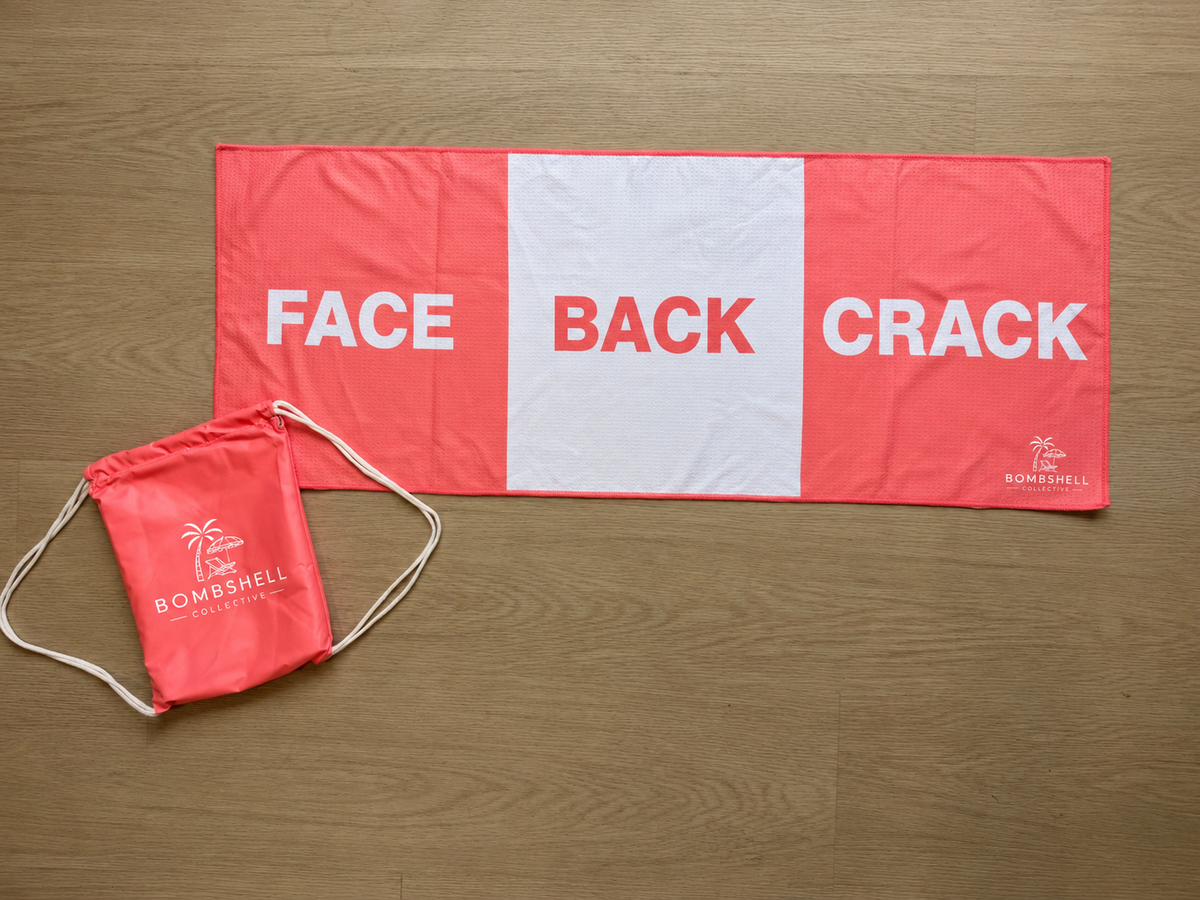 Bombshell Collective Face Back Crack gym towel in coral, featuring three labelled sections and a drawstring carry bag.