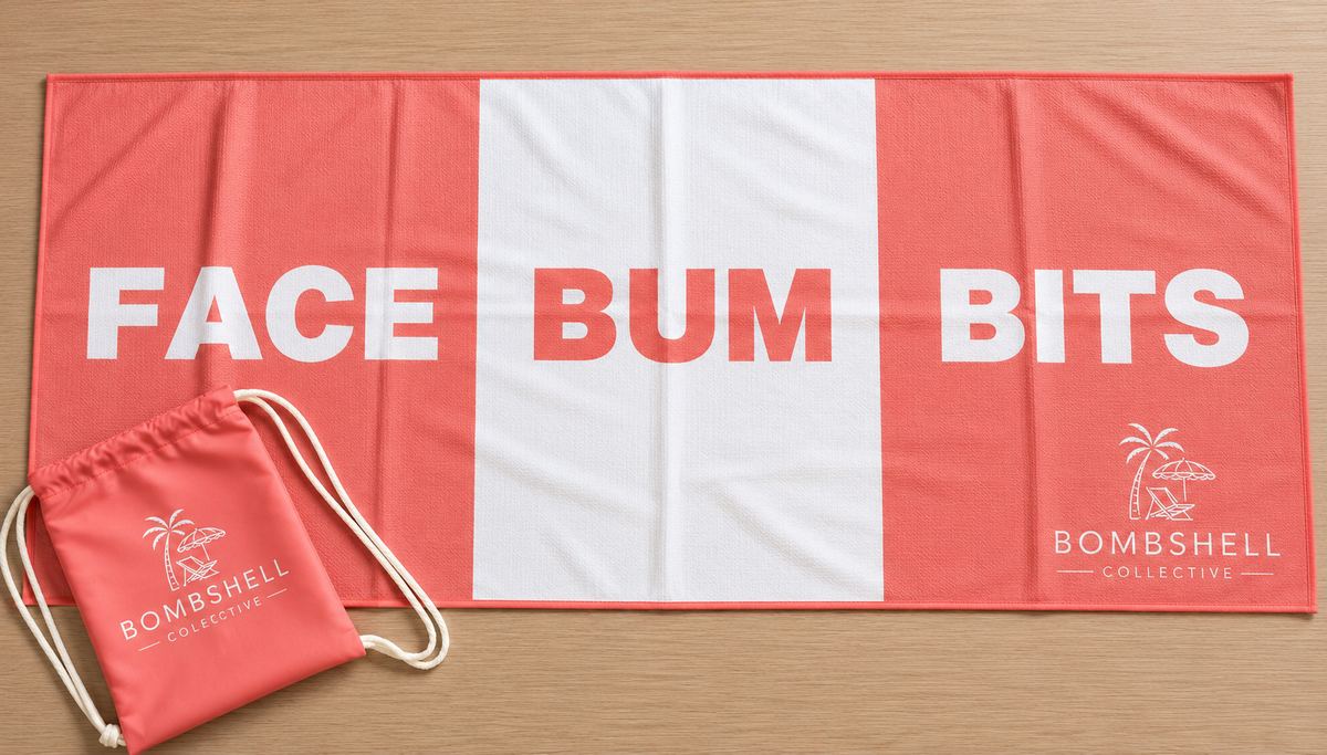 Bombshell Collective large Face Bum Bits beach towel in coral, featuring sand-free waffle microfibre fabric, bold lettering and a matching waterproof carry bag.
