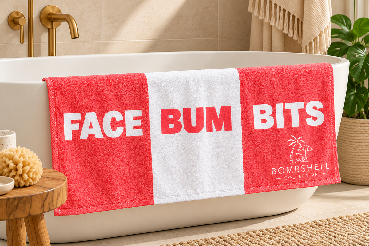 Coral and white novelty bath towel featuring Face Bum Bits sections by Bombshell Collective.