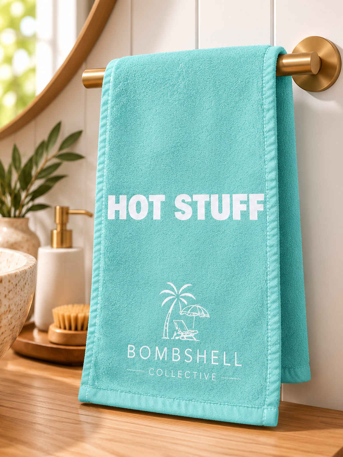 Aqua Hot Stuff novelty hand and face towel with soft textured fabric and playful white slogan.